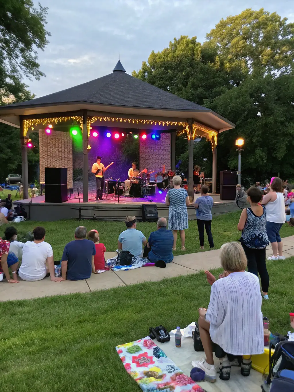 A dynamic image of a live musical performance at a SOCIETE DES FETES event, capturing the energy and excitement of the organization's live performances.